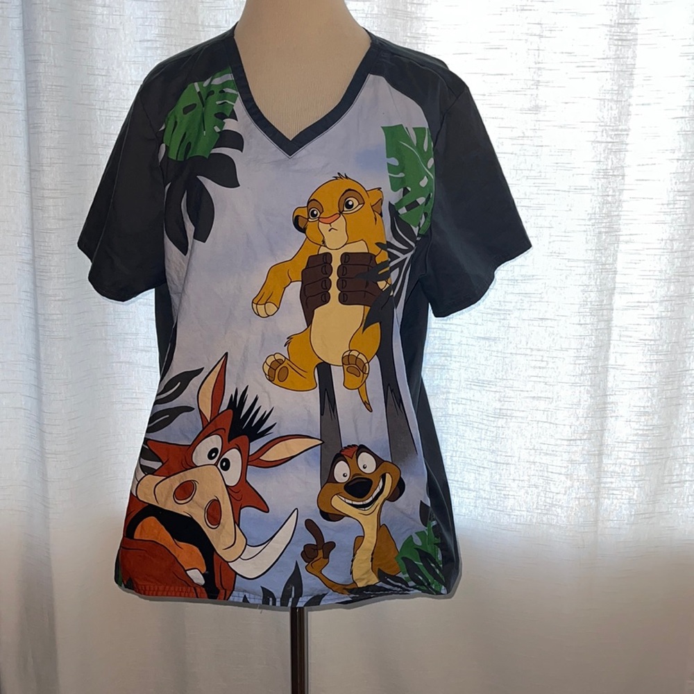 Disney Lion King Scrub top in Black, White, Green, Yellow, Brown